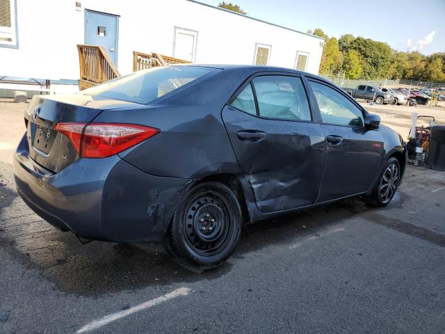 Photo 2 VIN: 5YFBURHE1KP870303 - TOYOTA COROLLA L 