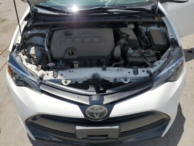 Photo 10 VIN: 5YFBURHE1KP871015 - TOYOTA COROLLA L 