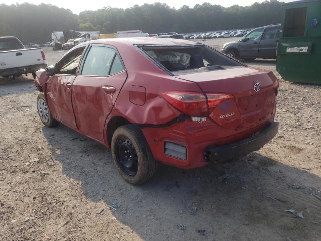 Photo 2 VIN: 5YFBURHE1KP876215 - TOYOTA COROLLA L 