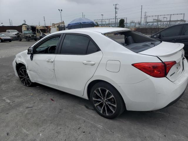 Photo 1 VIN: 5YFBURHE1KP878997 - TOYOTA COROLLA L 