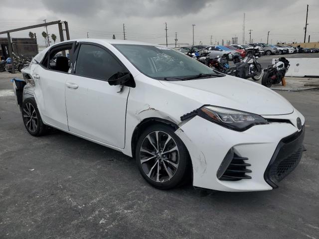 Photo 3 VIN: 5YFBURHE1KP878997 - TOYOTA COROLLA L 