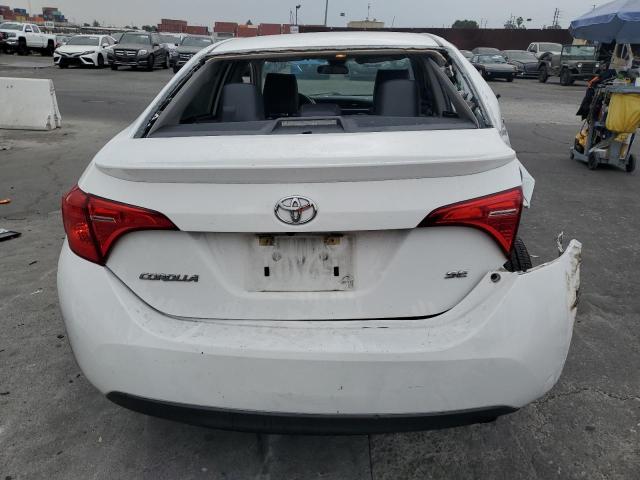 Photo 5 VIN: 5YFBURHE1KP878997 - TOYOTA COROLLA L 