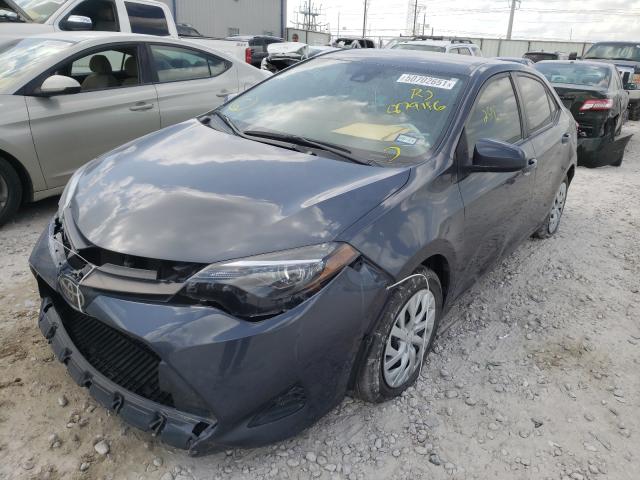 Photo 1 VIN: 5YFBURHE1KP879146 - TOYOTA COROLLA L 