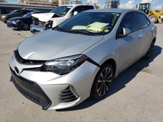 Photo 1 VIN: 5YFBURHE1KP880328 - TOYOTA COROLLA L 