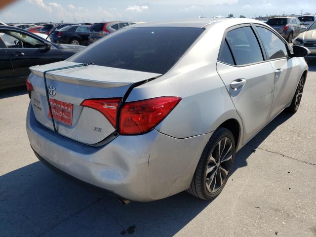 Photo 3 VIN: 5YFBURHE1KP880328 - TOYOTA COROLLA L 