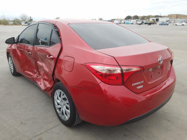 Photo 2 VIN: 5YFBURHE1KP881883 - TOYOTA COROLLA L 