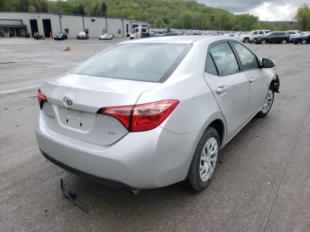 Photo 3 VIN: 5YFBURHE1KP883049 - TOYOTA COROLLA L 