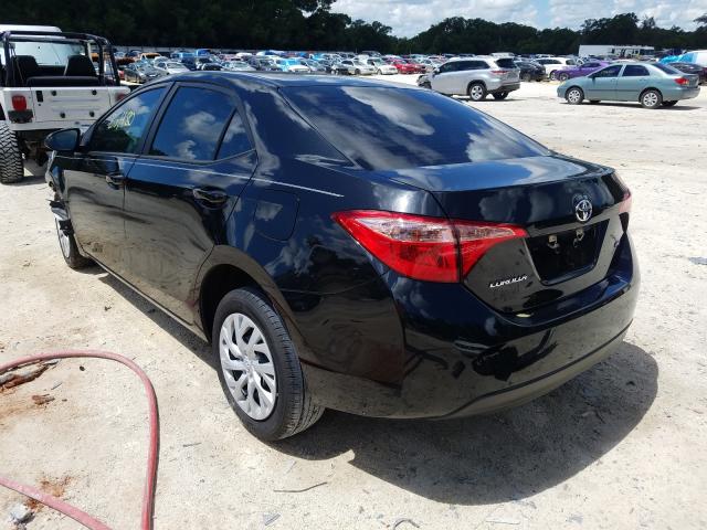 Photo 2 VIN: 5YFBURHE1KP883469 - TOYOTA COROLLA L 