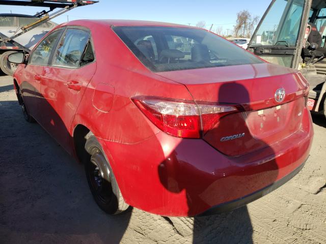 Photo 2 VIN: 5YFBURHE1KP884783 - TOYOTA COROLLA L 