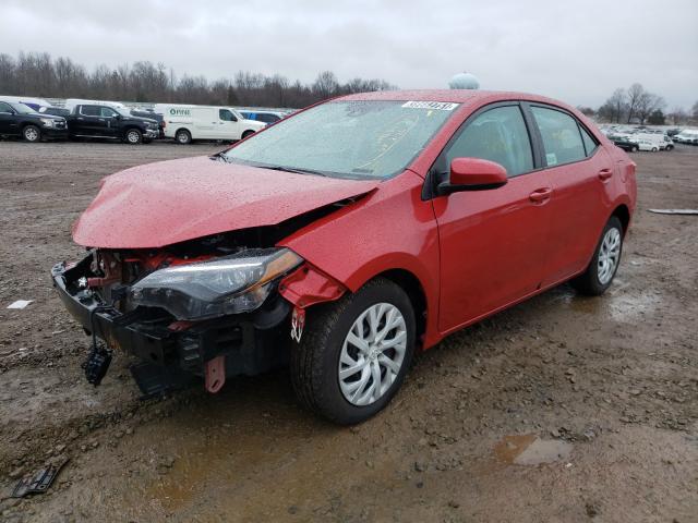 Photo 1 VIN: 5YFBURHE1KP885500 - TOYOTA COROLLA L 