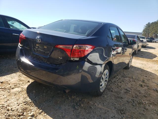 Photo 3 VIN: 5YFBURHE1KP885979 - TOYOTA COROLLA L 