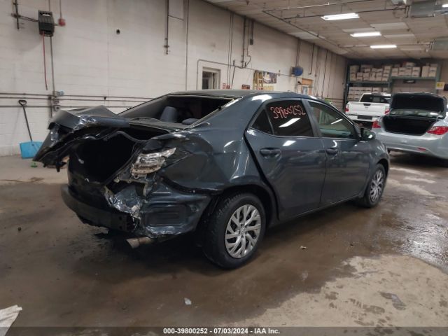 Photo 3 VIN: 5YFBURHE1KP886100 - TOYOTA COROLLA 