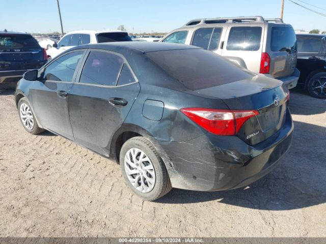 Photo 2 VIN: 5YFBURHE1KP887859 - TOYOTA COROLLA 