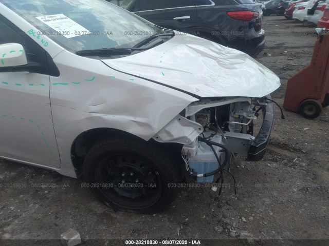 Photo 5 VIN: 5YFBURHE1KP888378 - TOYOTA COROLLA 