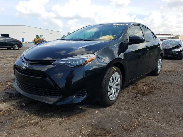 Photo 1 VIN: 5YFBURHE1KP892849 - TOYOTA COROLLA L 