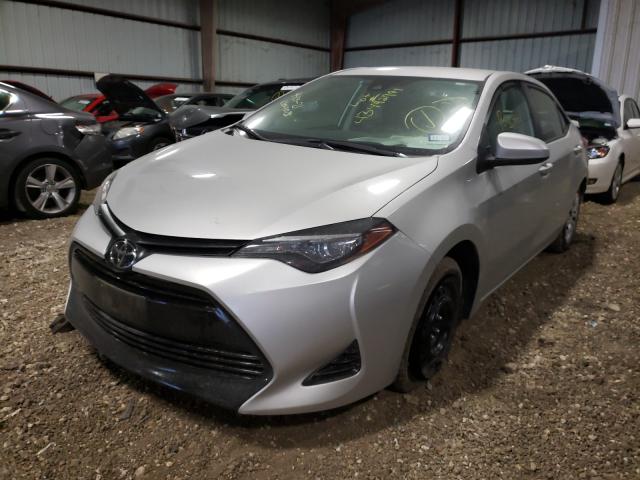 Photo 1 VIN: 5YFBURHE1KP893273 - TOYOTA COROLLA L 