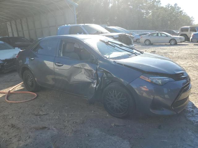 Photo 3 VIN: 5YFBURHE1KP895444 - TOYOTA COROLLA L 