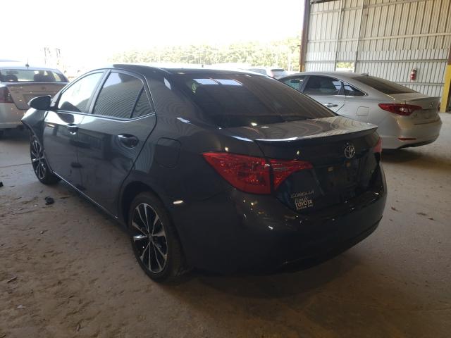 Photo 2 VIN: 5YFBURHE1KP896285 - TOYOTA COROLLA L 