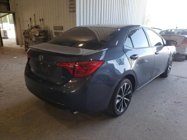 Photo 3 VIN: 5YFBURHE1KP896285 - TOYOTA COROLLA L 