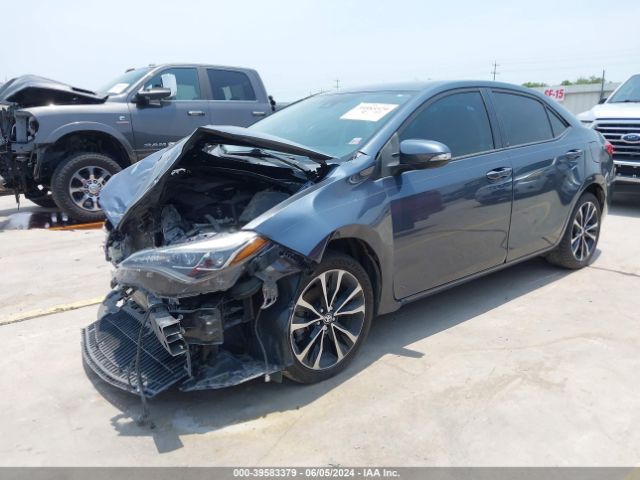 Photo 1 VIN: 5YFBURHE1KP898621 - TOYOTA COROLLA 