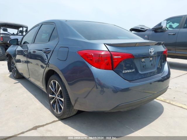 Photo 2 VIN: 5YFBURHE1KP898621 - TOYOTA COROLLA 