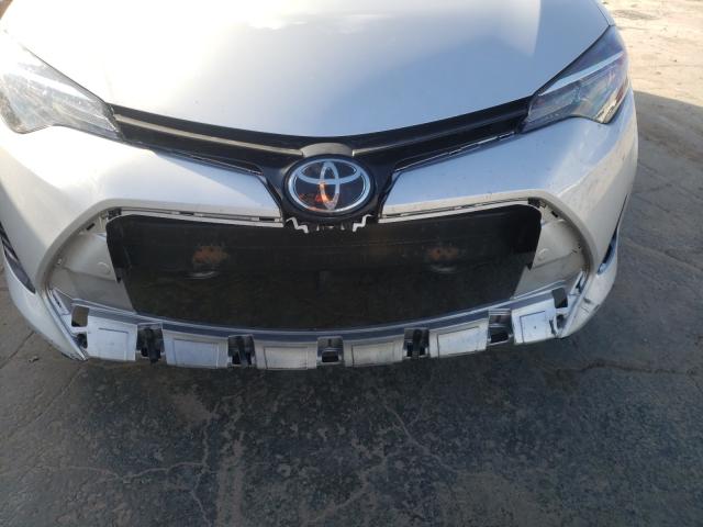 Photo 8 VIN: 5YFBURHE1KP898800 - TOYOTA COROLLA L 