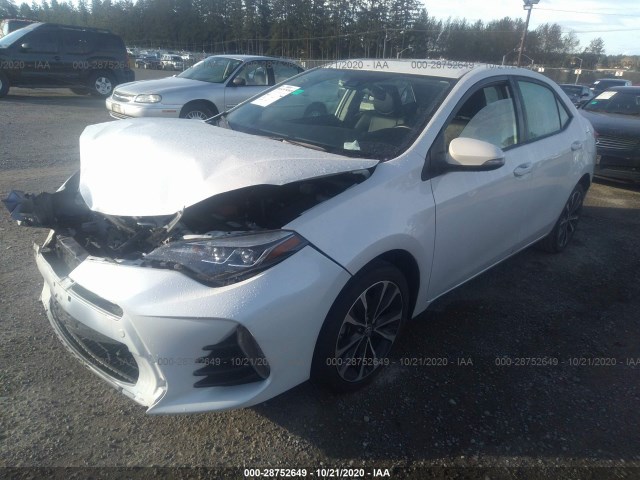 Photo 1 VIN: 5YFBURHE1KP904658 - TOYOTA COROLLA 