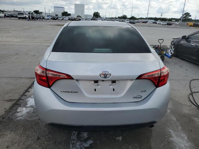 Photo 5 VIN: 5YFBURHE1KP907284 - TOYOTA COROLLA 