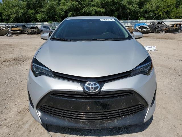 Photo 4 VIN: 5YFBURHE1KP908404 - TOYOTA COROLLA L 