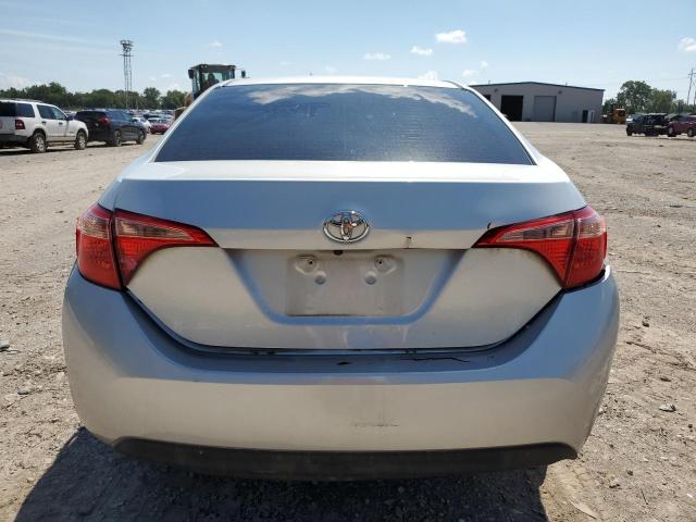 Photo 5 VIN: 5YFBURHE1KP908404 - TOYOTA COROLLA L 