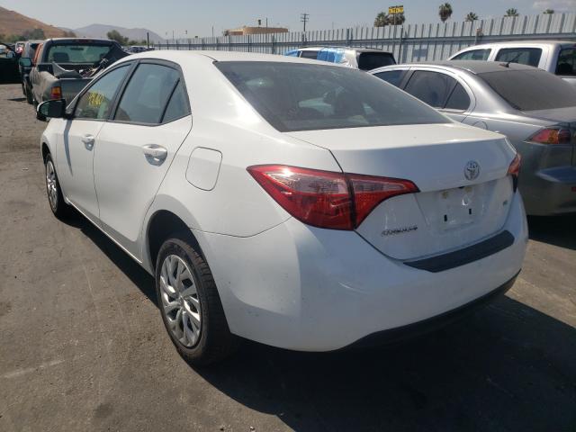 Photo 2 VIN: 5YFBURHE1KP908578 - TOYOTA COROLLA L 