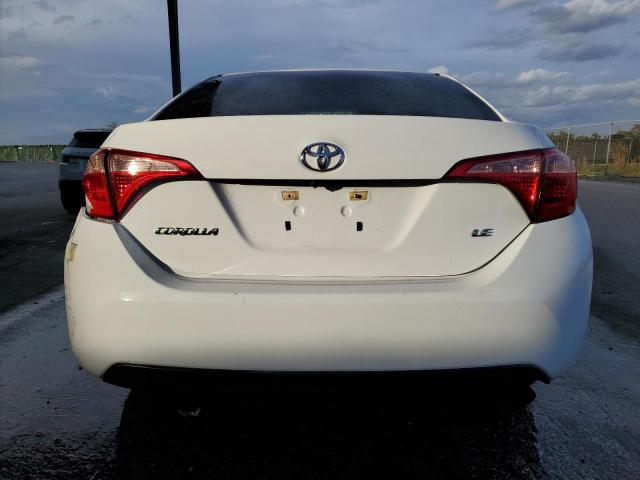 Photo 5 VIN: 5YFBURHE1KP908774 - TOYOTA COROLLA 