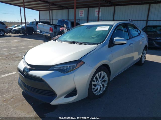 Photo 1 VIN: 5YFBURHE1KP909813 - TOYOTA COROLLA 