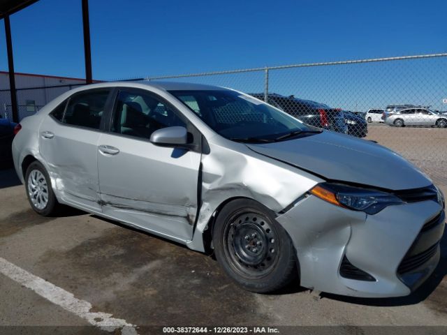 Photo 5 VIN: 5YFBURHE1KP909813 - TOYOTA COROLLA 