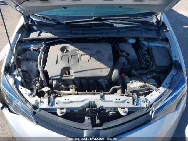 Photo 9 VIN: 5YFBURHE1KP909813 - TOYOTA COROLLA 