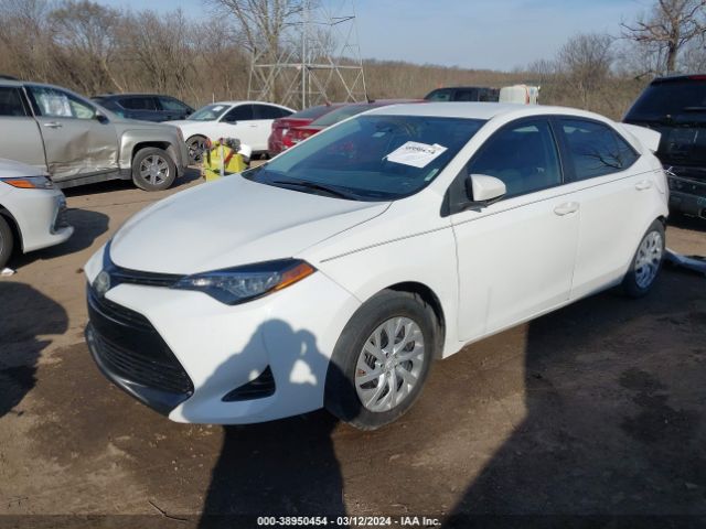 Photo 1 VIN: 5YFBURHE1KP909889 - TOYOTA COROLLA 