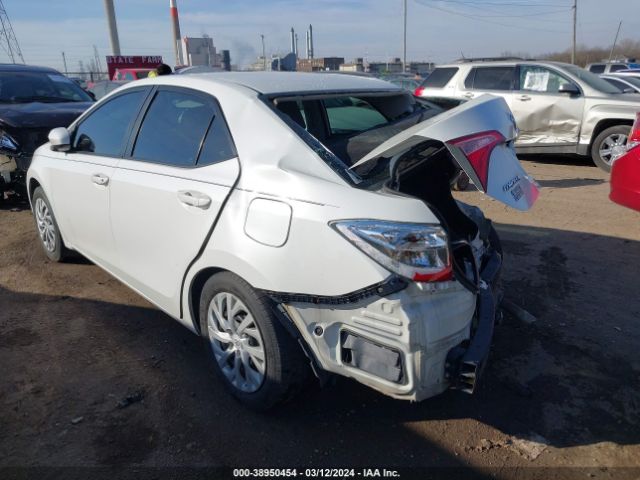 Photo 2 VIN: 5YFBURHE1KP909889 - TOYOTA COROLLA 