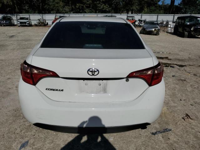 Photo 5 VIN: 5YFBURHE1KP913568 - TOYOTA COROLLA 