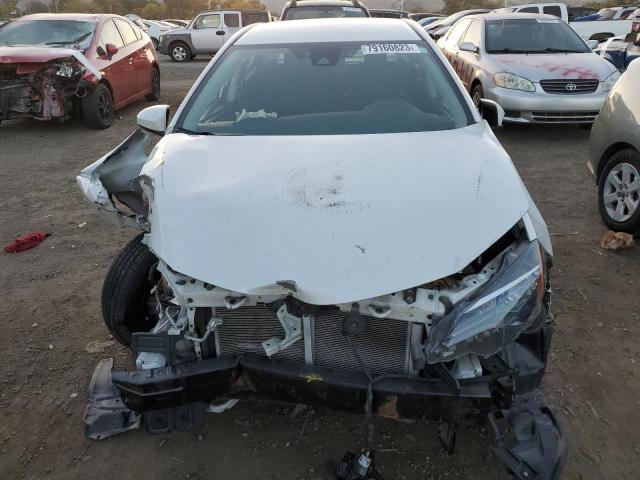 Photo 4 VIN: 5YFBURHE1KP915529 - TOYOTA COROLLA 