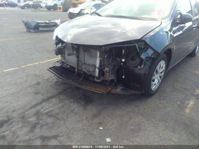 Photo 5 VIN: 5YFBURHE1KP921041 - TOYOTA COROLLA 