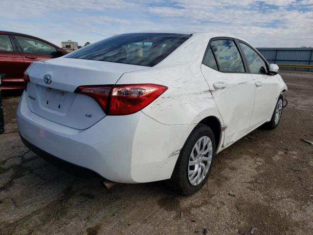 Photo 3 VIN: 5YFBURHE1KP929057 - TOYOTA COROLLA L 