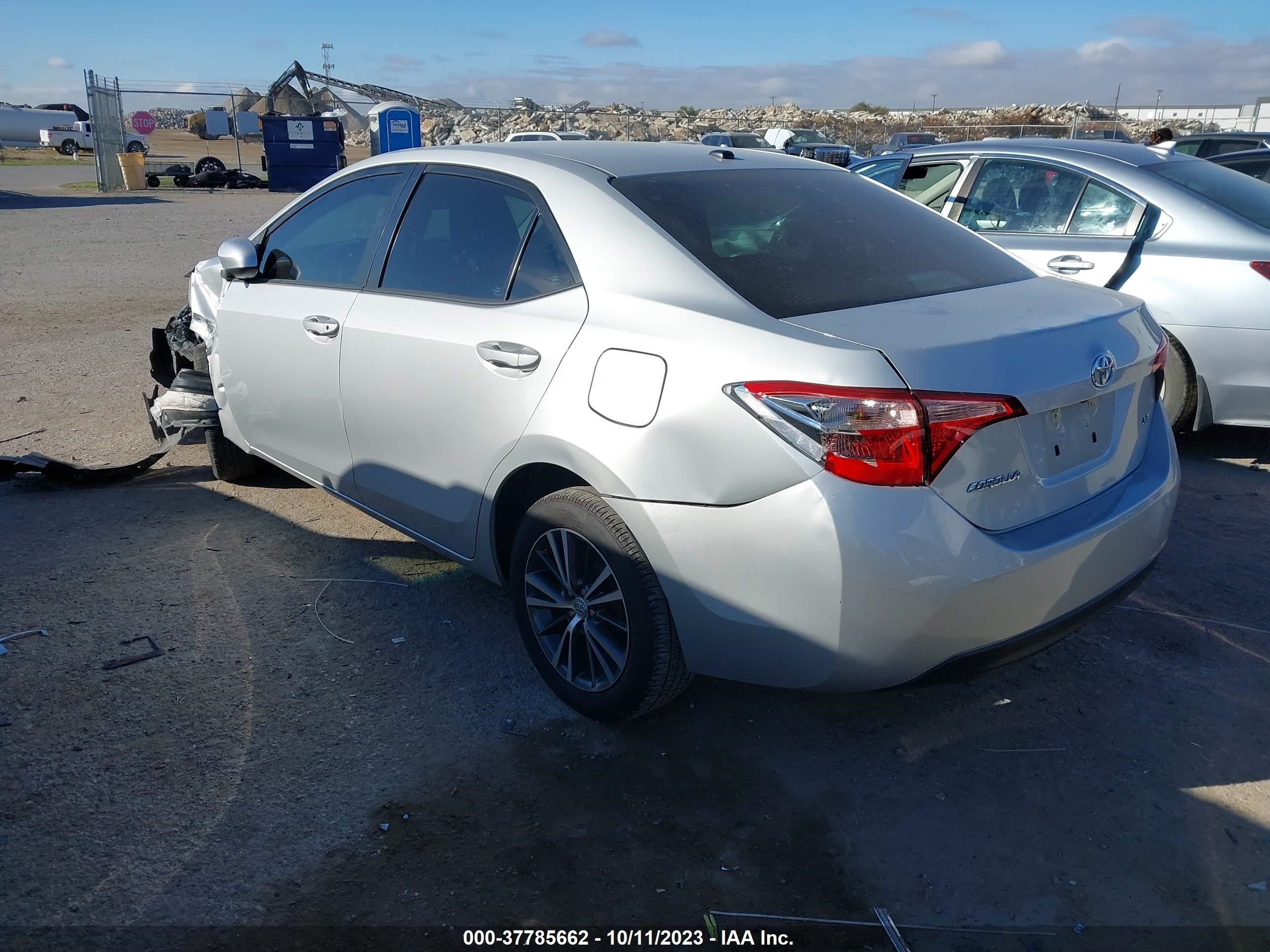 Photo 2 VIN: 5YFBURHE1KP931939 - TOYOTA COROLLA 