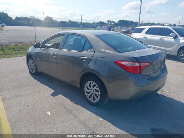 Photo 2 VIN: 5YFBURHE1KP945243 - TOYOTA COROLLA 