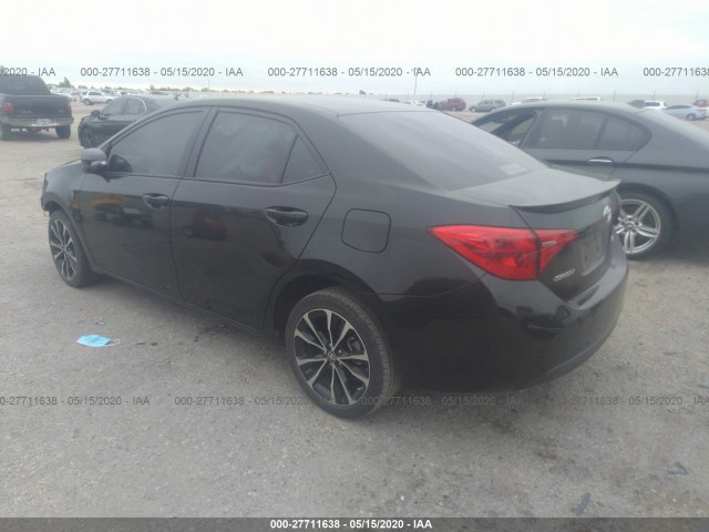 Photo 2 VIN: 5YFBURHE1KP946960 - TOYOTA COROLLA 