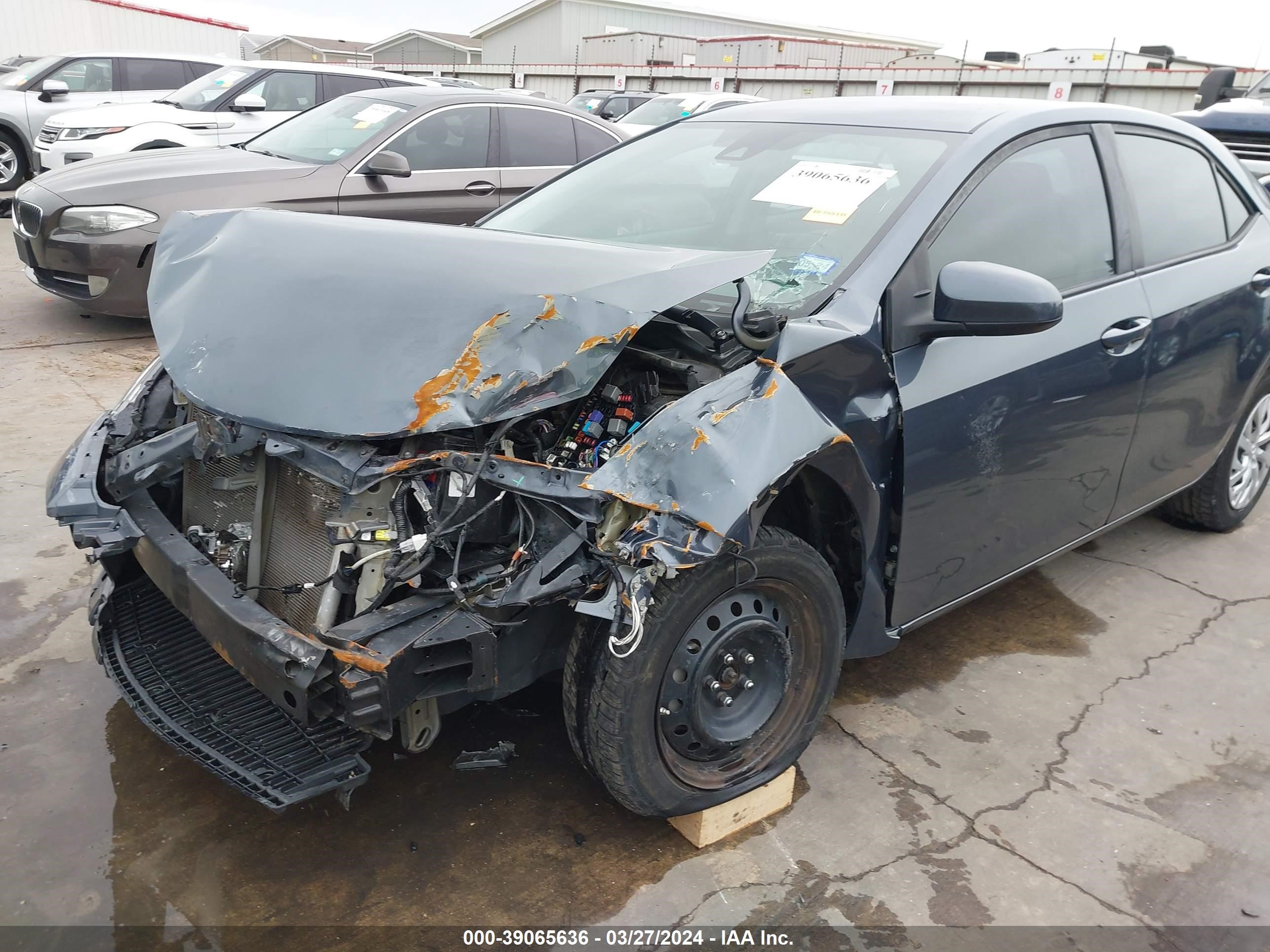 Photo 5 VIN: 5YFBURHE1KP949356 - TOYOTA COROLLA 