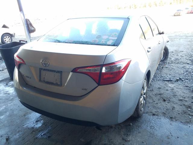 Photo 3 VIN: 5YFBURHE2EP064068 - TOYOTA COROLLA L 