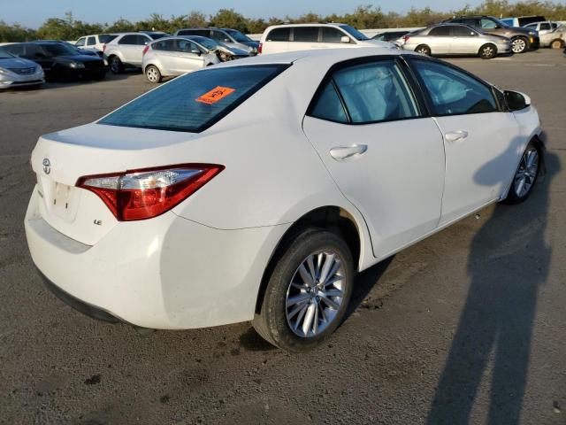 Photo 2 VIN: 5YFBURHE2EP086149 - TOYOTA COROLLA L 