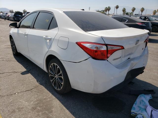 Photo 2 VIN: 5YFBURHE2EP101037 - TOYOTA COROLLA L 