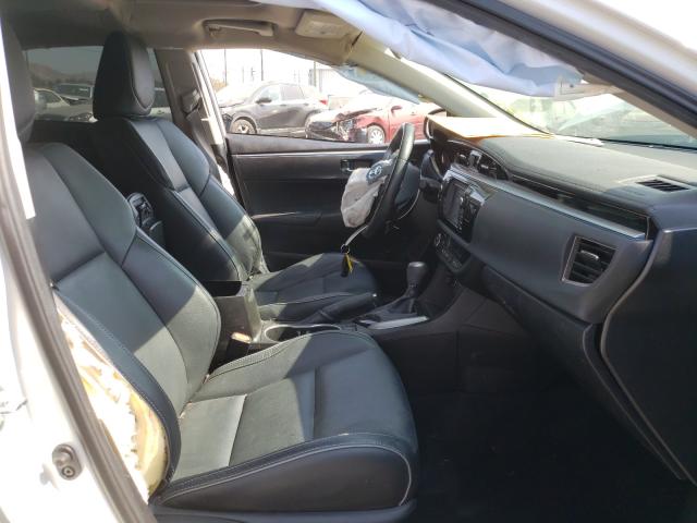 Photo 4 VIN: 5YFBURHE2EP101037 - TOYOTA COROLLA L 