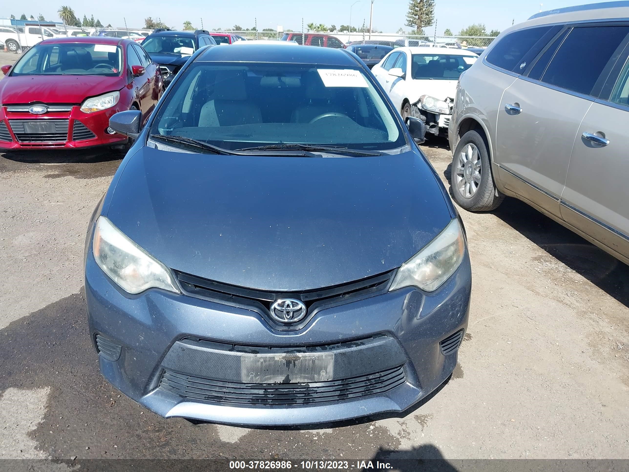 Photo 11 VIN: 5YFBURHE2EP171699 - TOYOTA COROLLA 